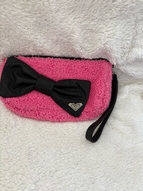 Roxy Hot Pink Faux Shearling Wristlet with Black Bow Accent